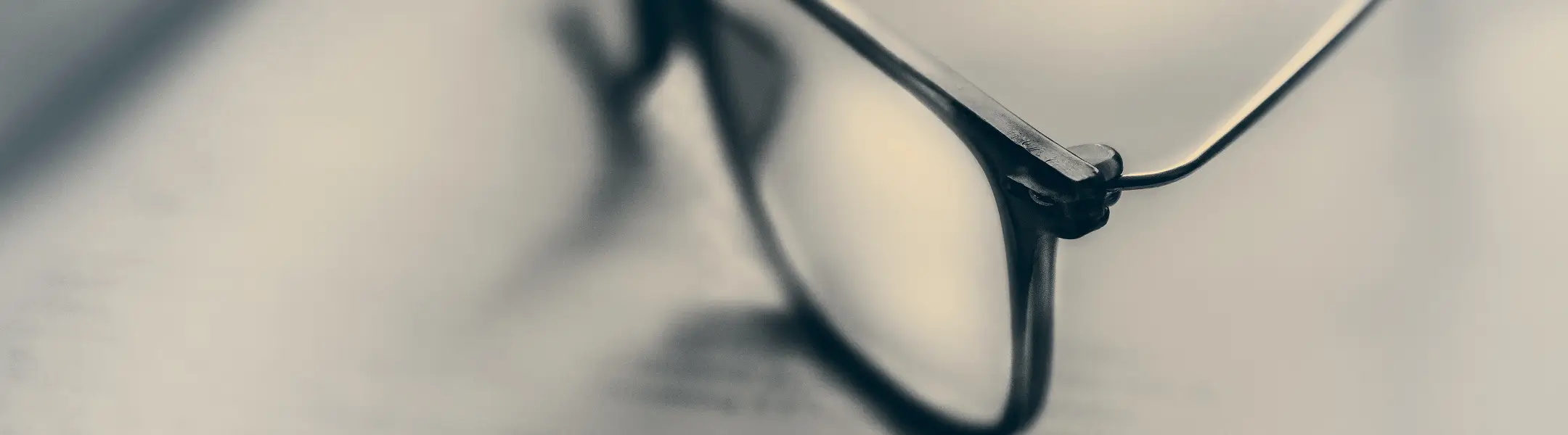 Close-up of stylish eyeglasses; metal frame, modern design.